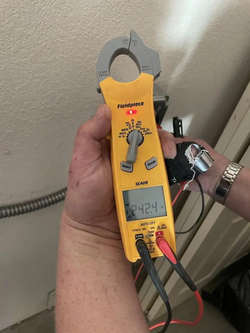 Voltage testing with clamp meter during Generator Installation in La Puente